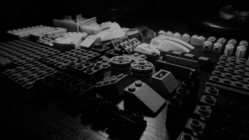 a black and white photo of a table with legos