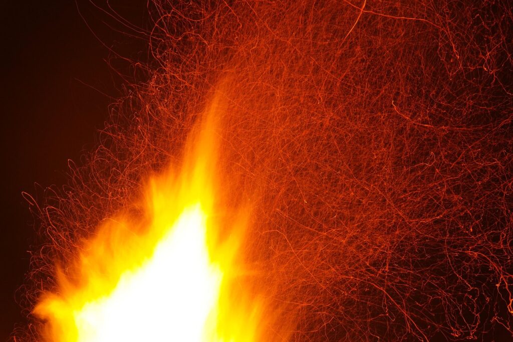 flying sparks, spark, red, yellow, glow, flames, blaze, campfire, romantic, energy, warmth, heat, spark fountain, spark, spark, flames, flames, energy, energy, energy, energy, energy