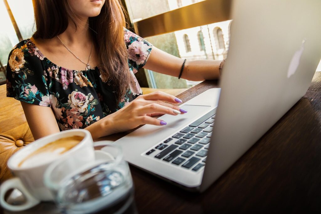 woman, laptop, desk, workspace, macbook, technology, work, working, working woman, coffee cup, coffee, computer, cup, girl, mug