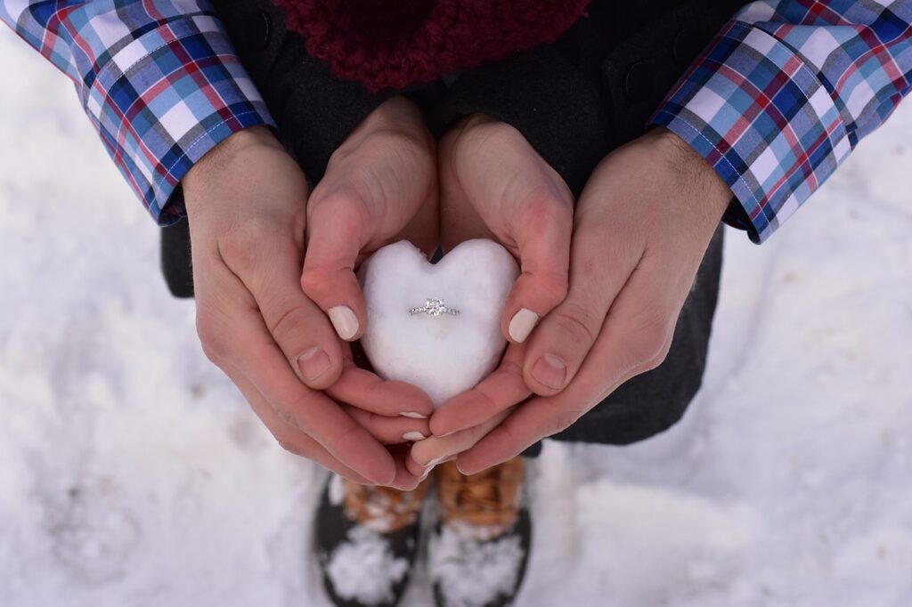love, engaged, romantic, romance, couple, together, holding, ring, diamond, snow, heart, hands, diamond ring, woman, man, proposal, nature, marriage, hand, happiness