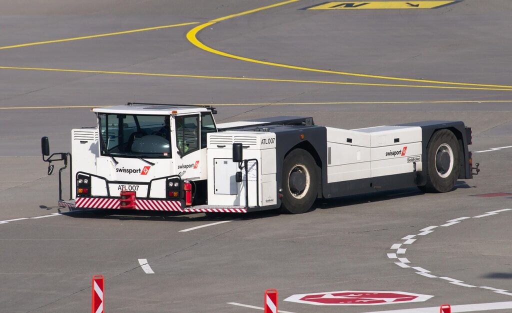 goldhofer, tractor, towing vehicle, airport, plane, swissport, truck, swissport, swissport, swissport, swissport, swissport