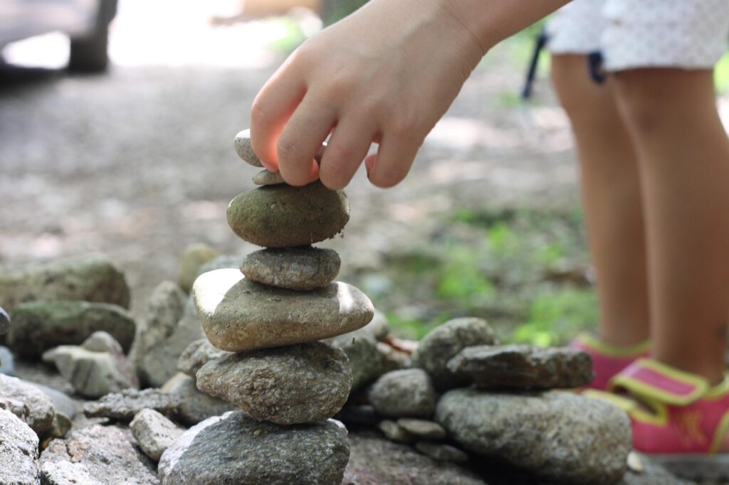 stone tower, stone, wish top, child, children's wish top