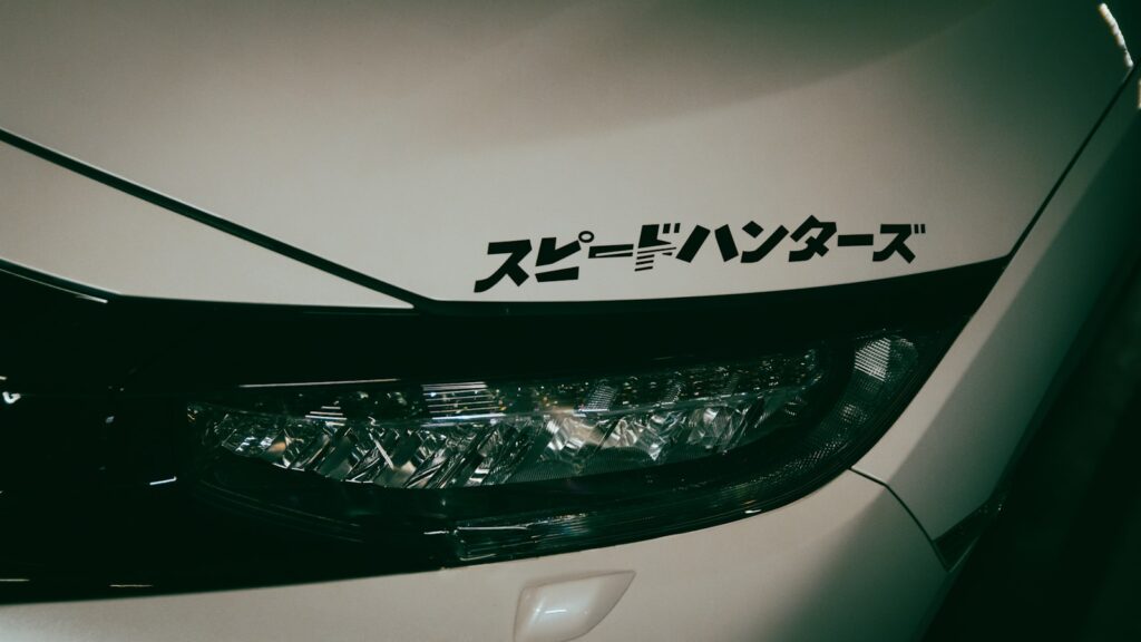a close up of a car with japanese writing on it