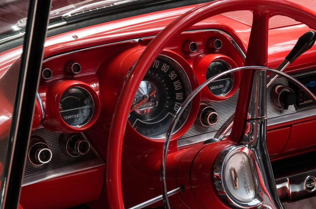 automobile, transport system, vehicle, ride, chrome, steering wheel, classic, speedometer, dashboard, chevrolet, bel air, antique car, inner space, mileage display, old, advertisement, fitting, speed display, odometer, fuel gauge