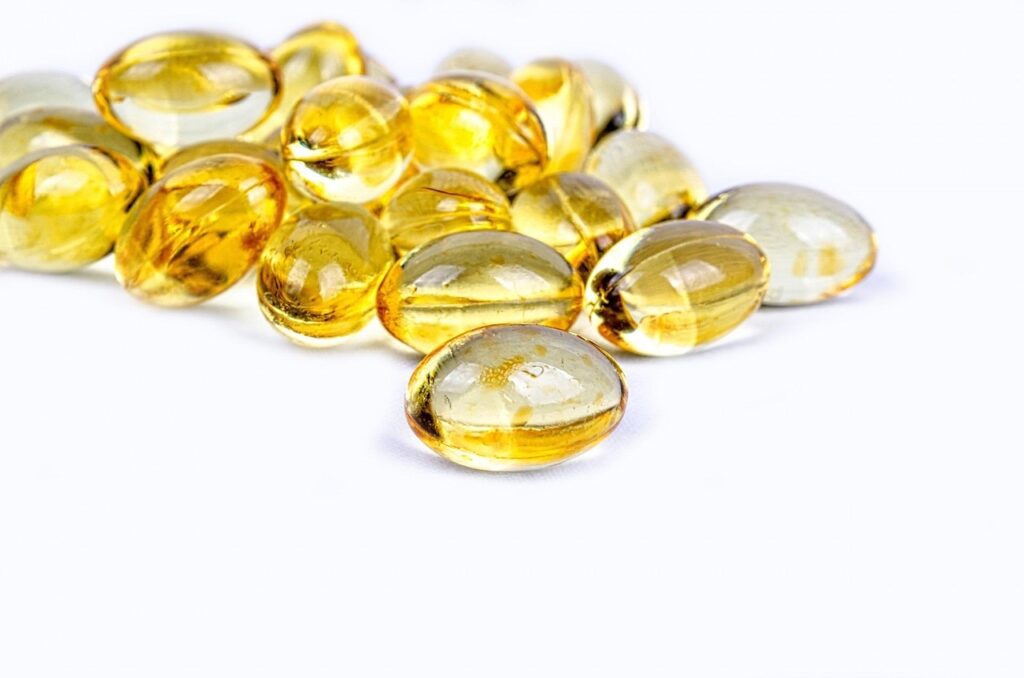 pill, yellow, isolated, herbal medicine, isolated white, cod liver oil, fish oil, vitamin d, horizontal, close-up, medicine, healthy eating, colour, healthy, healthy lifestyle, translucent, wellbeing, capsule, nutrient, vitamin d, vitamin d, vitamin d, vitamin d, vitamin d