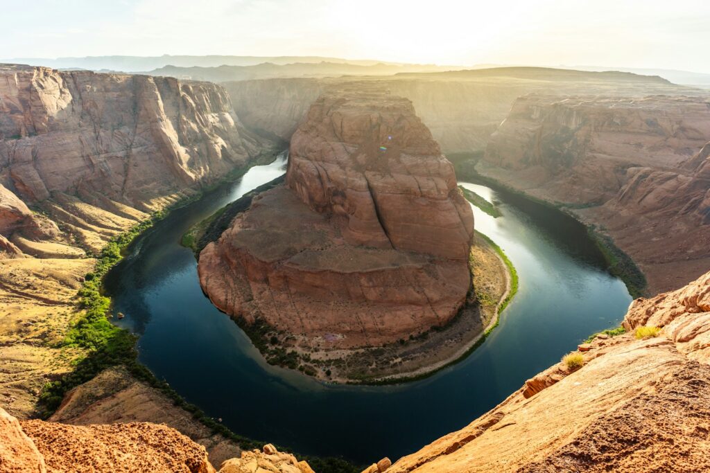 A view of a river in the middle of a canyon