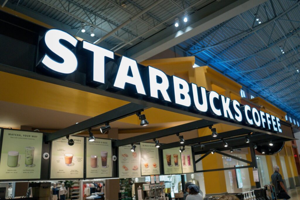 Starbucks coffee shop interior with illuminated sign