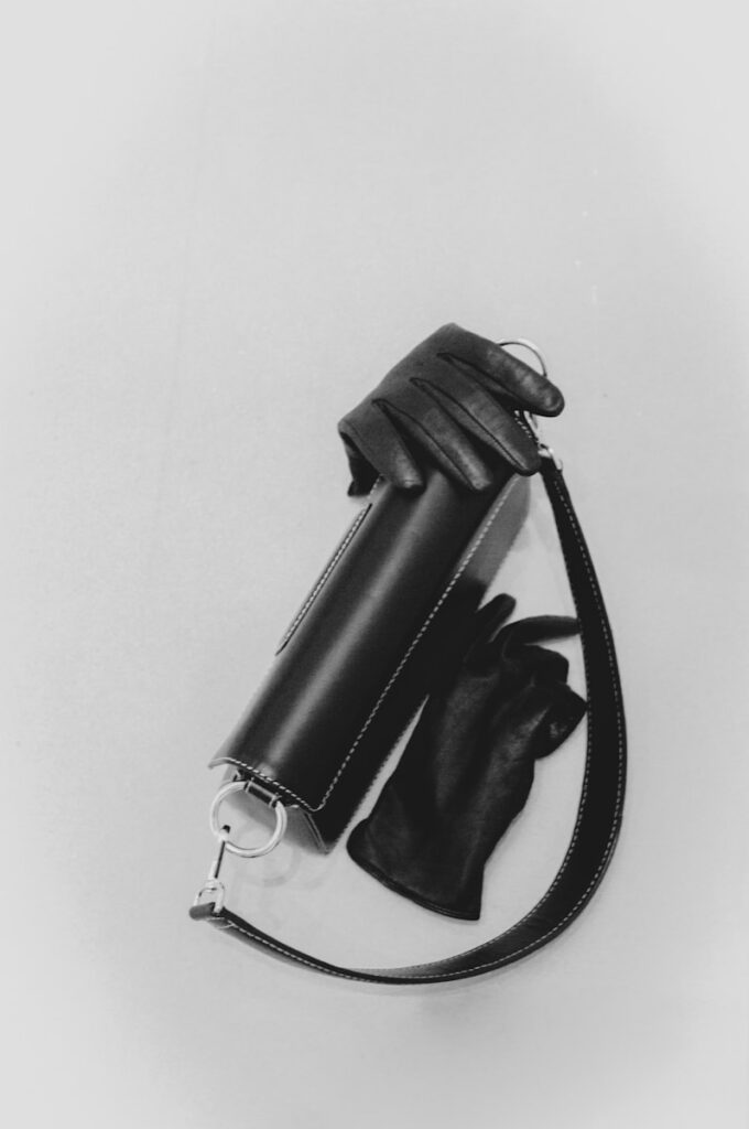 a black and white photo of a pair of gloves