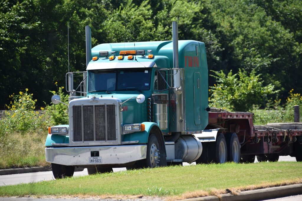 truck, 18 wheeler, nature, flatbed, transport, industrial, heavy, worker, car transportation, rig, equipment, machinery, development, blue, grass, forest, moving, service, heavy duty, cross country, driving, move, fast, grill, headlamp, exhaust