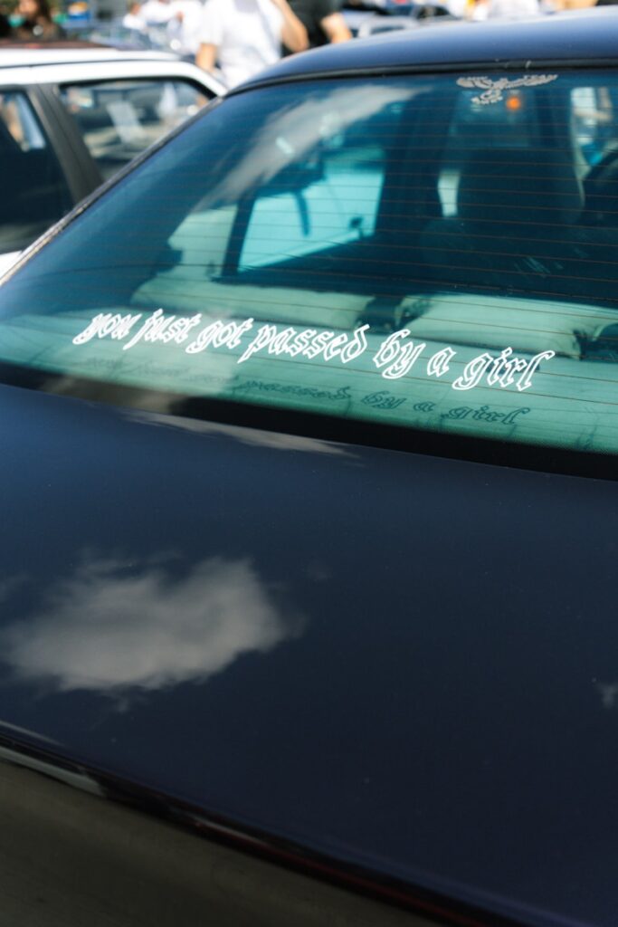 a close up of a car with a sticker on it