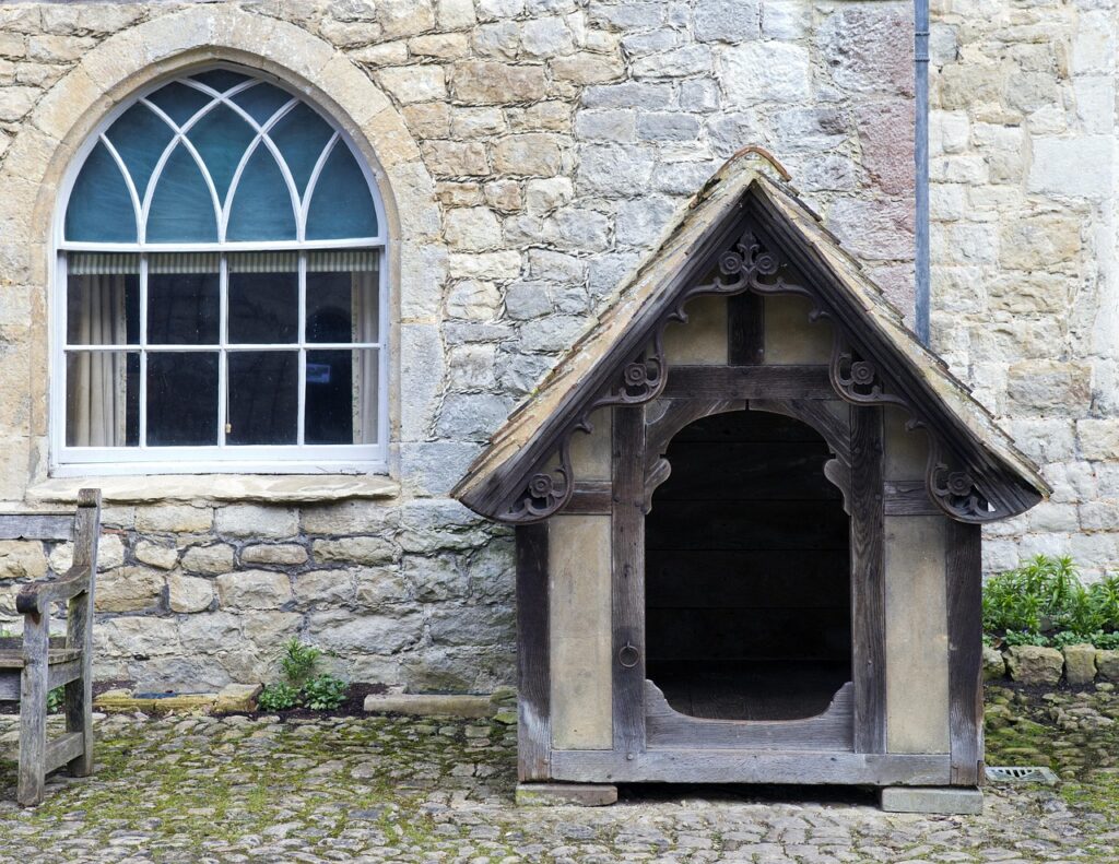 elaborate dog's kennel, medieval courtyard, late georgian window, paving setts, ightham mote, kent, uk
