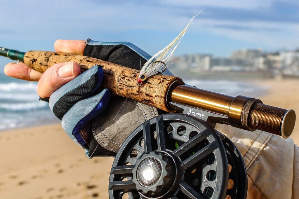 fly fishing, fishing reel, sun gloves, fishing lure, fly fishing rod, nature, fisherman, hobby, leisure, outdoors, beach, margate, south coast, south africa, closeup