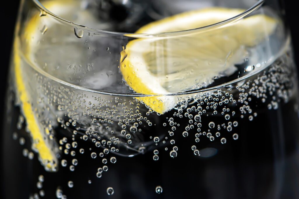 bubbles, lemon, slice of lemon, citrus, refreshment, water bubbles, ice cubes, cold drink, fresh lemonade, bubbling water, sparks of water, cocktail, gin and tonic, party, celebration, alcohol, highball, spirits, alcoholic beverage, happy hour, tonic, yellow black, thirst, drinking glass, soft drink, lemon, lemon, lemon, lemon, lemon, party, party, party, party, alcohol, alcohol, happy hour, soft drink