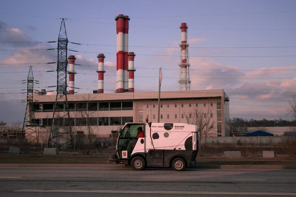 white and green van on road during daytime