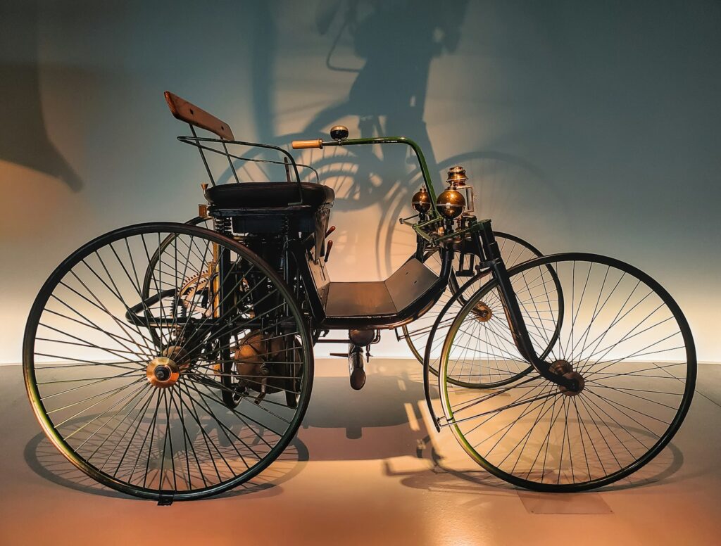 an old fashioned bicycle on display in a museum