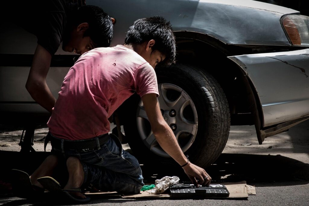 child labor, car mechanic, cars, labor, kid, mechanic, child labor, child labor, child labor, child labor, child labor, car mechanic, car mechanic, labor, mechanic, mechanic, mechanic