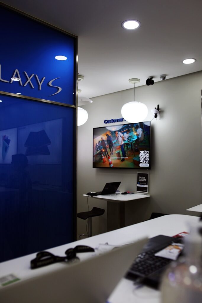 a room that has a television on the wall