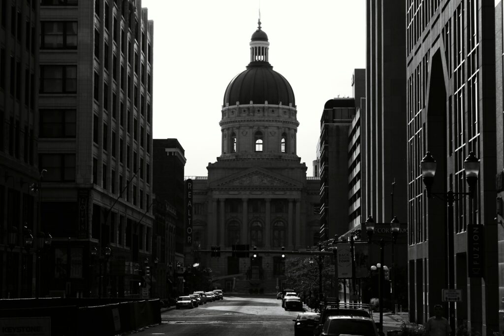 grayscale photo of city buildings