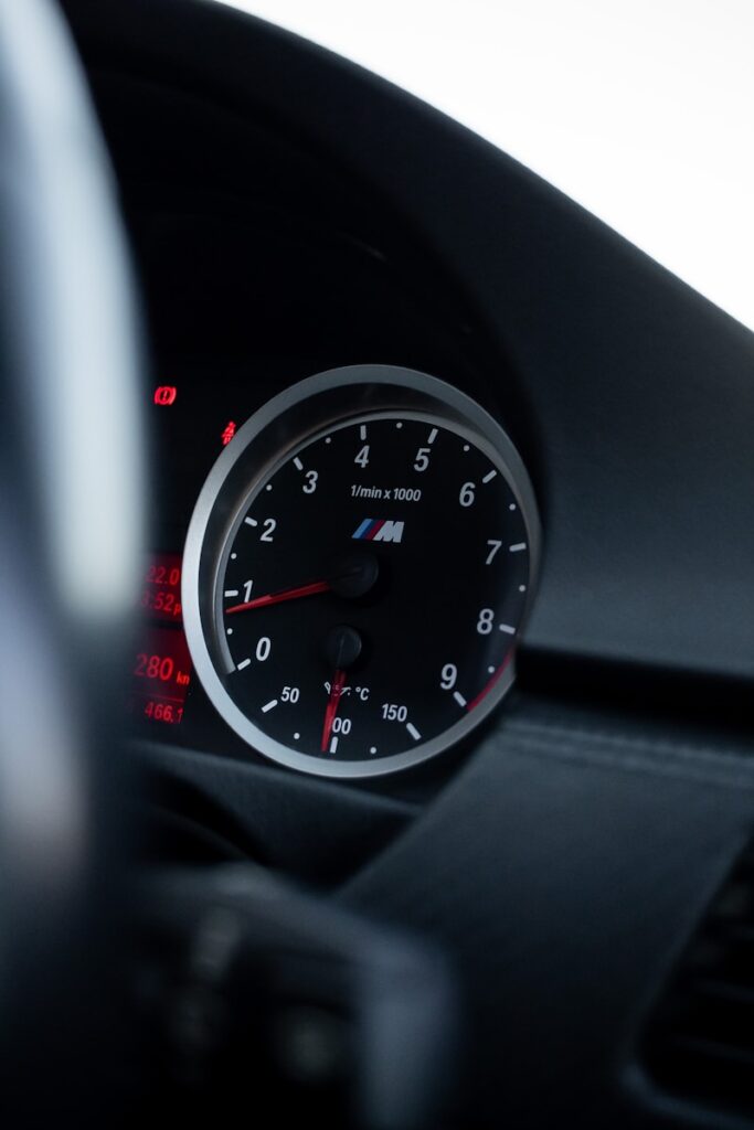 a close up of a speedometer in a car