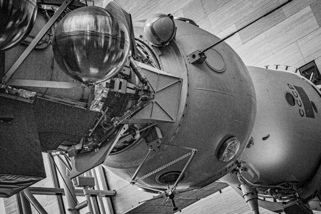 A soviet vostok spacecraft on display.