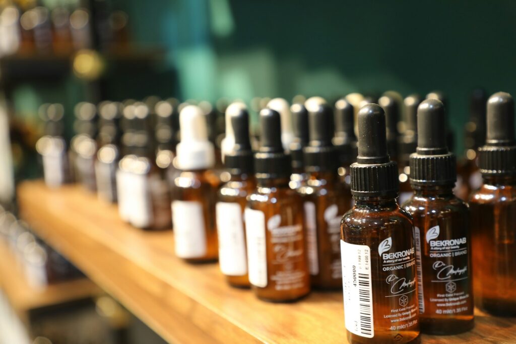 brown glass bottles on brown wooden table