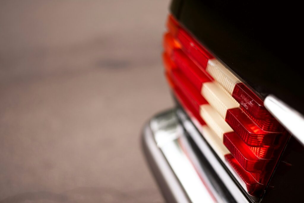 a close-up of a red and black pencil