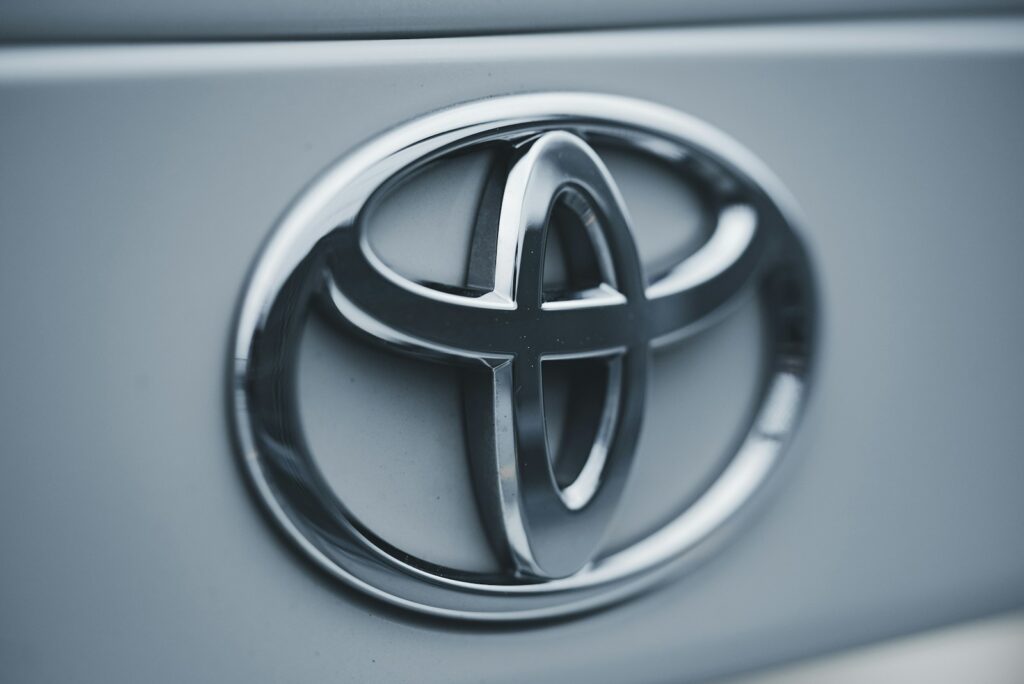 a close up of a toyota emblem on a car