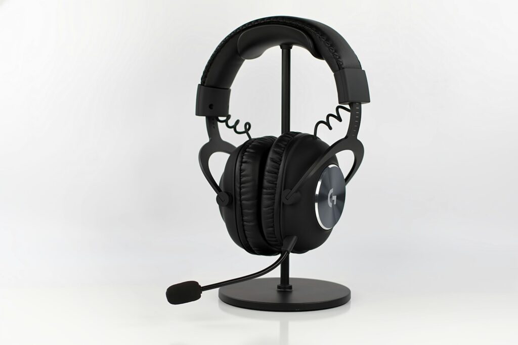 a pair of headphones sitting on top of a stand