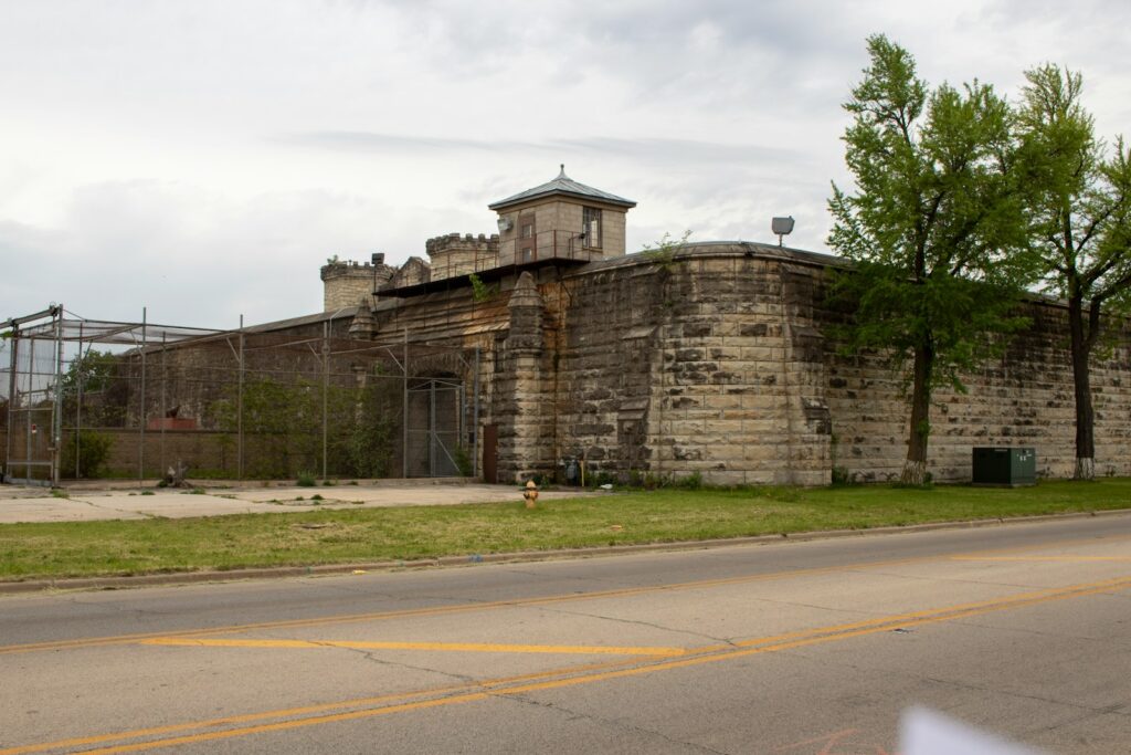 a large brick building sitting next to a road