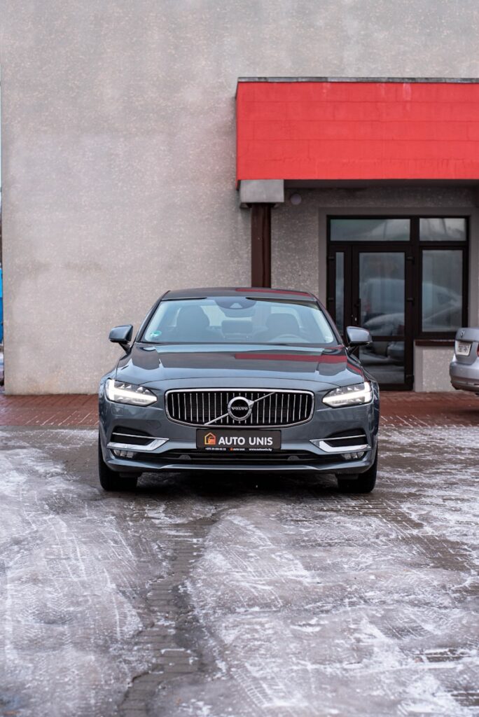 a car parked in front of a building