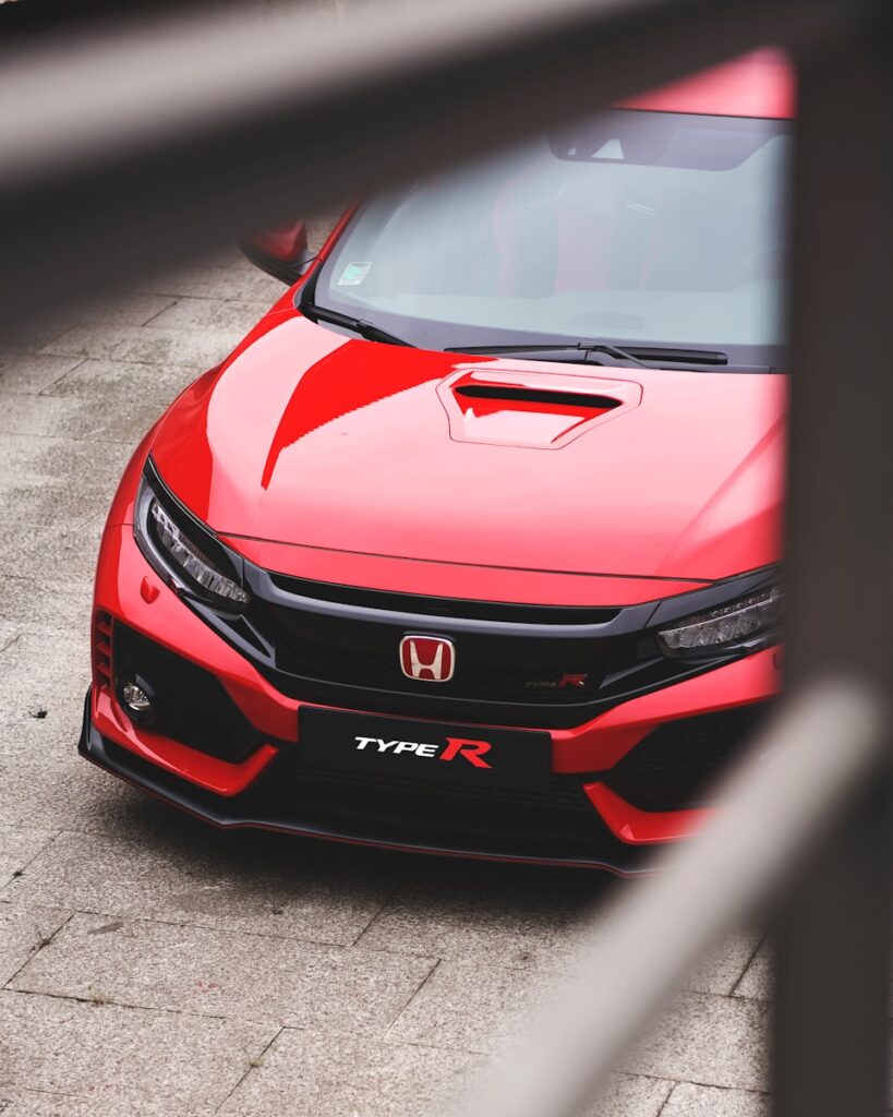 red Honda vehicle