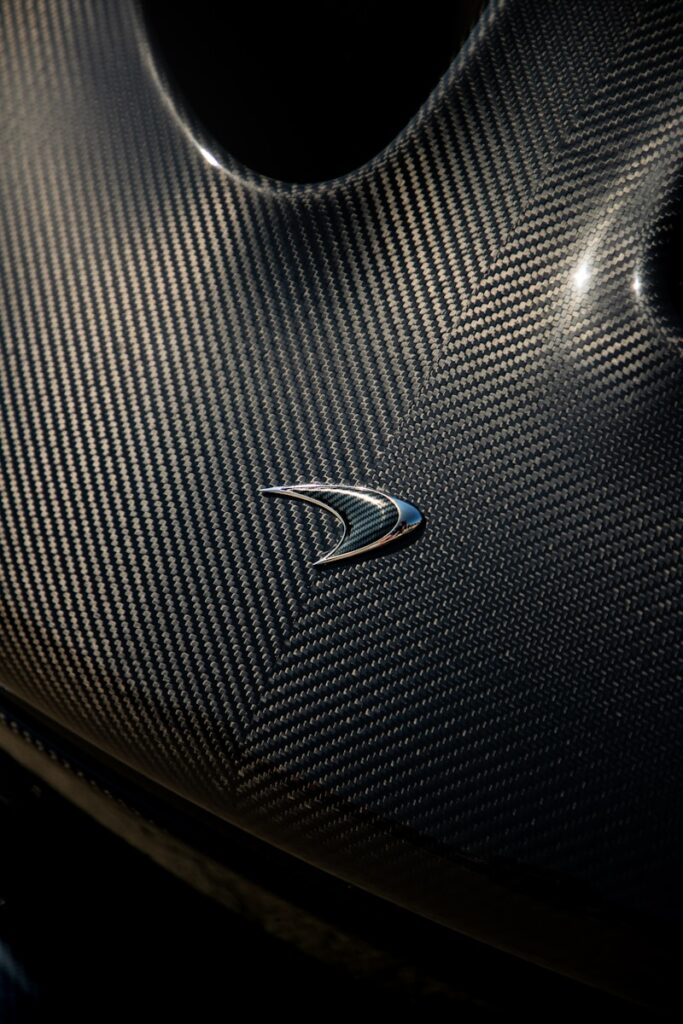 A close up of a car's emblem on a vehicle