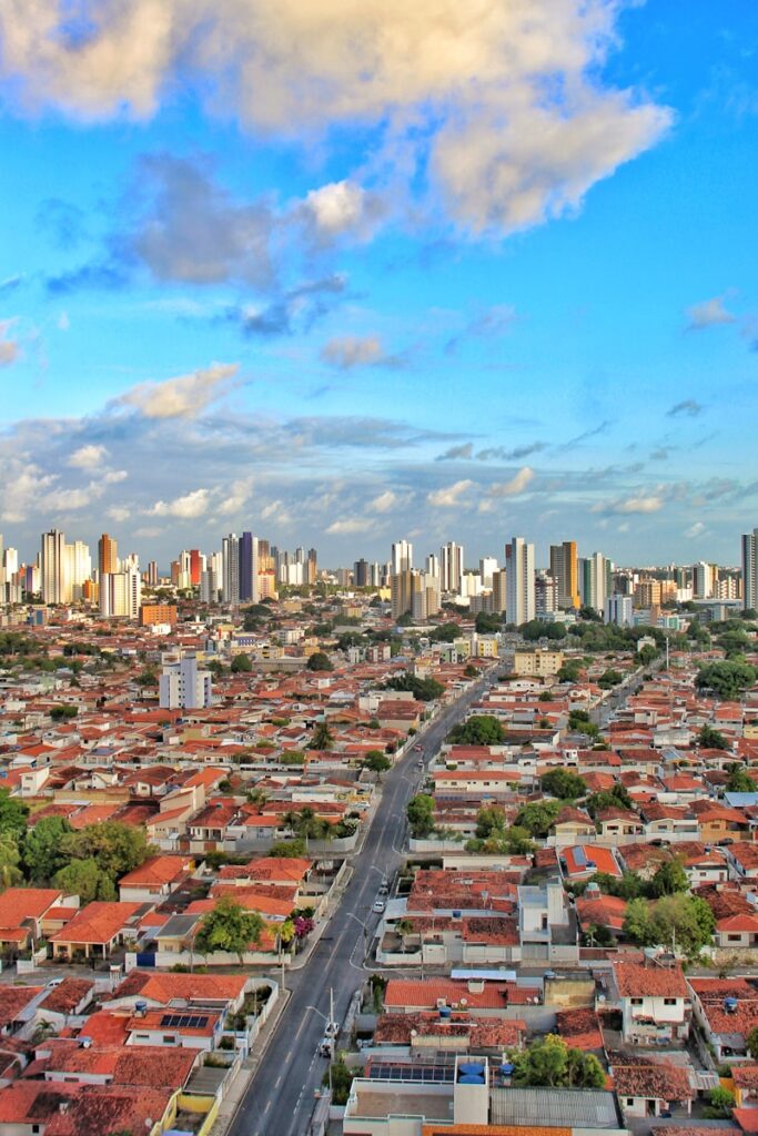 An aerial view of a city with tall buildings