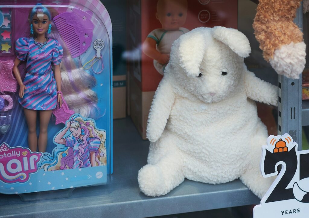 a close up of a stuffed animal on a shelf