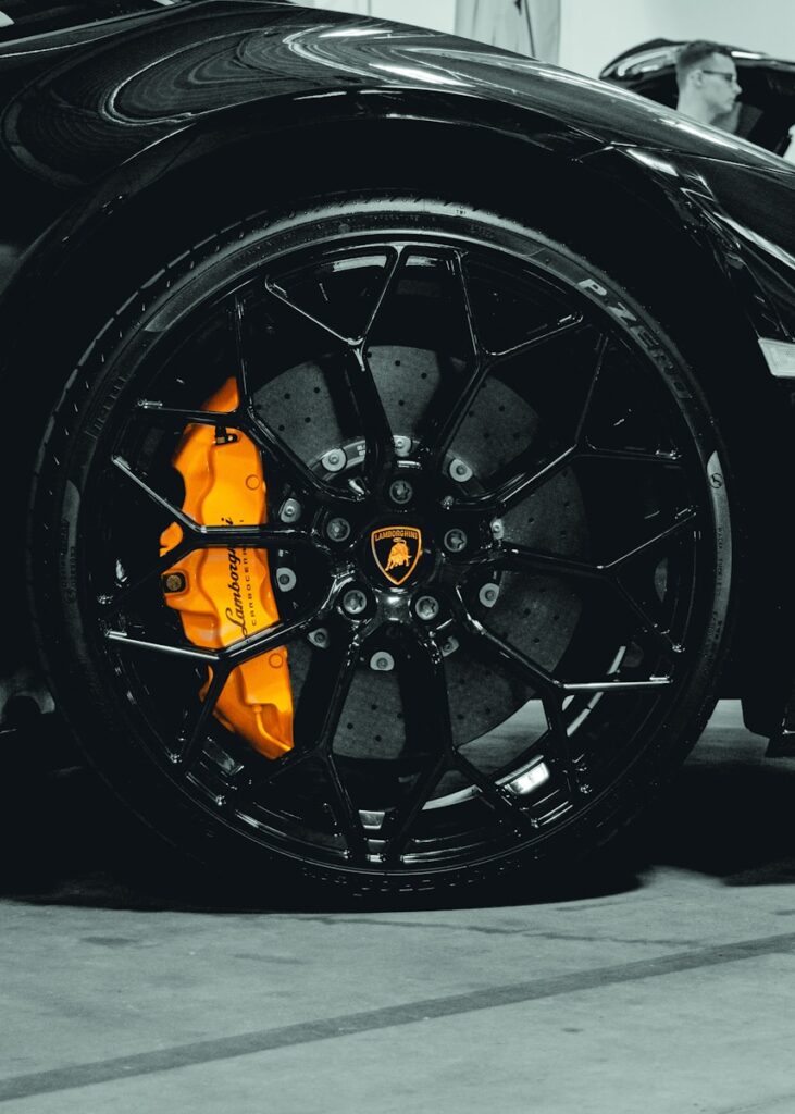 A close up of a black sports car