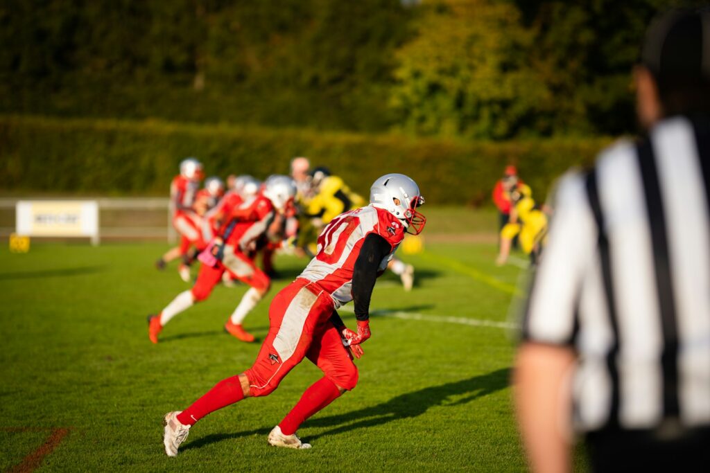 a group of young men playing a game of football