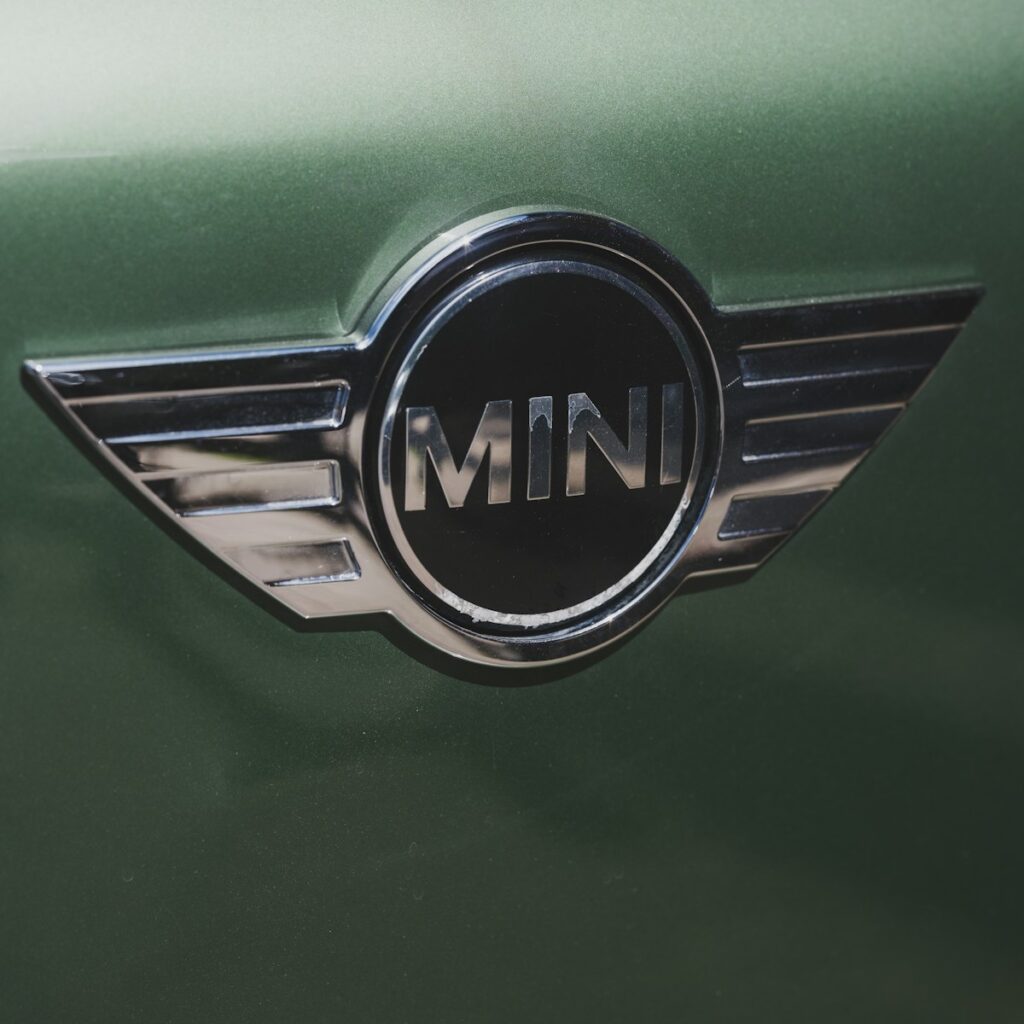 Mini cooper emblem on a car.