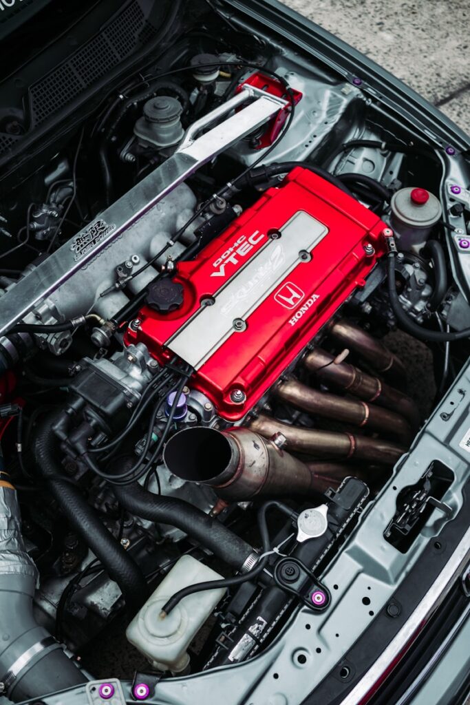 the engine of a car with its hood open