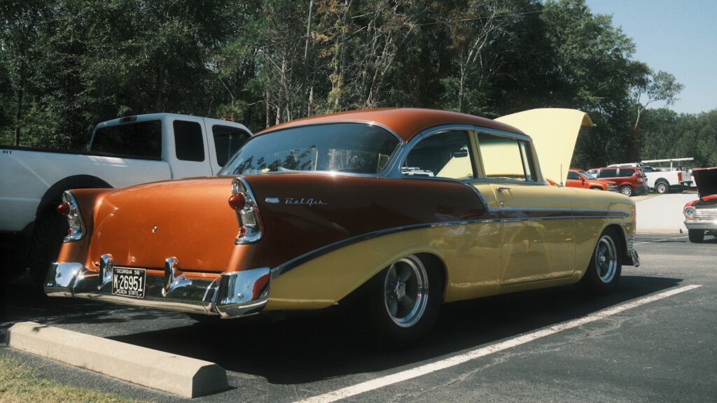Beautiful vintage car with yellow and brown color.