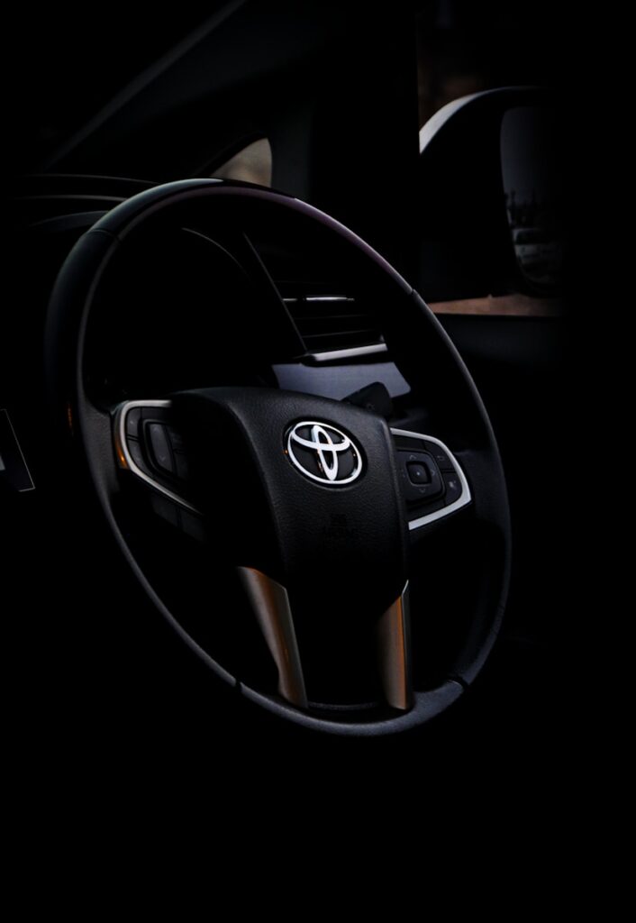 black and silver mercedes benz steering wheel