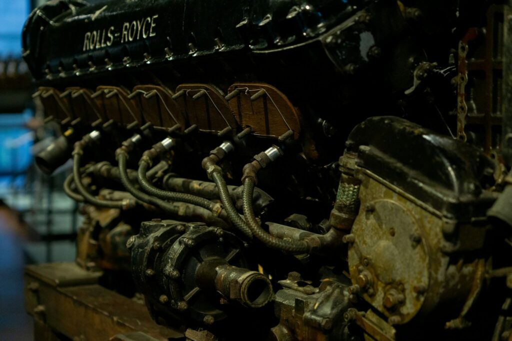 a close up of an old engine on a table