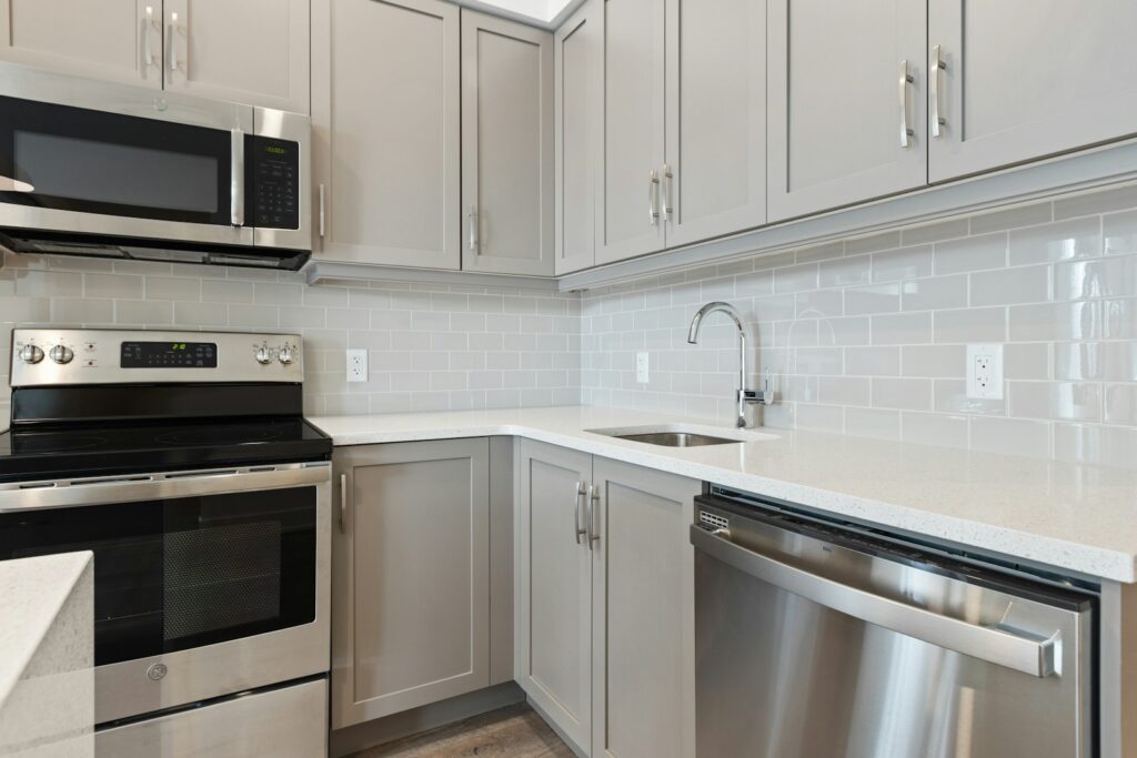silver and black microwave oven