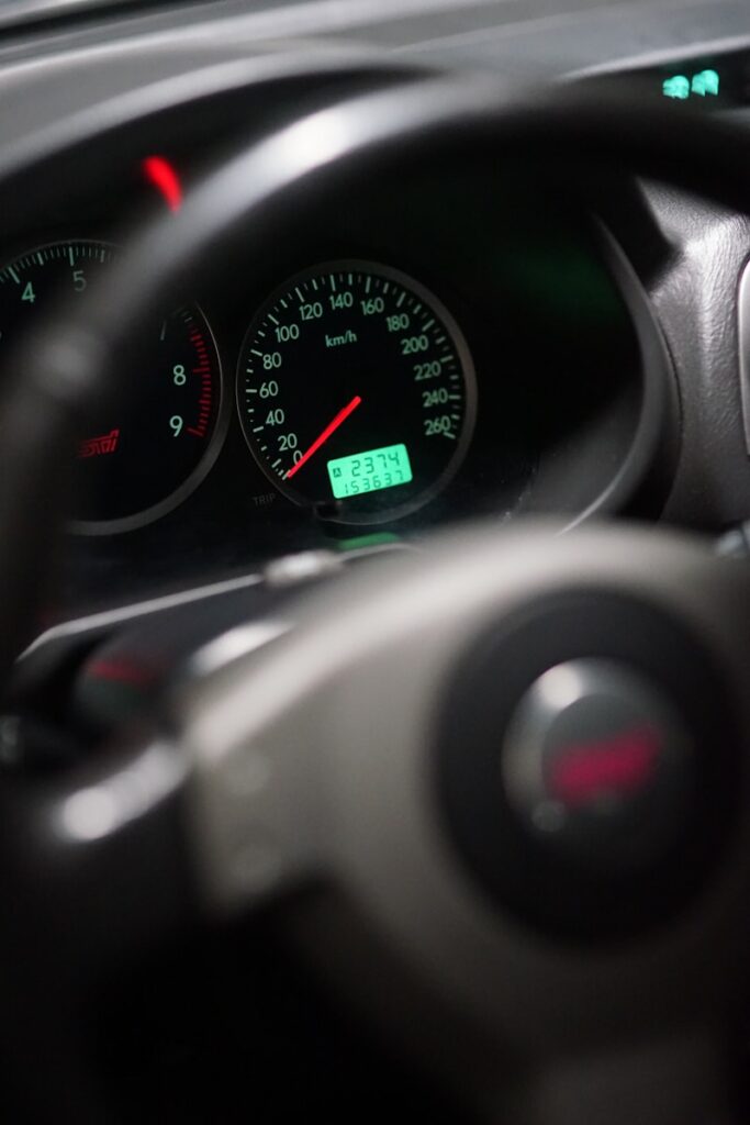 Close-up of a car's dashboard and steering wheel.