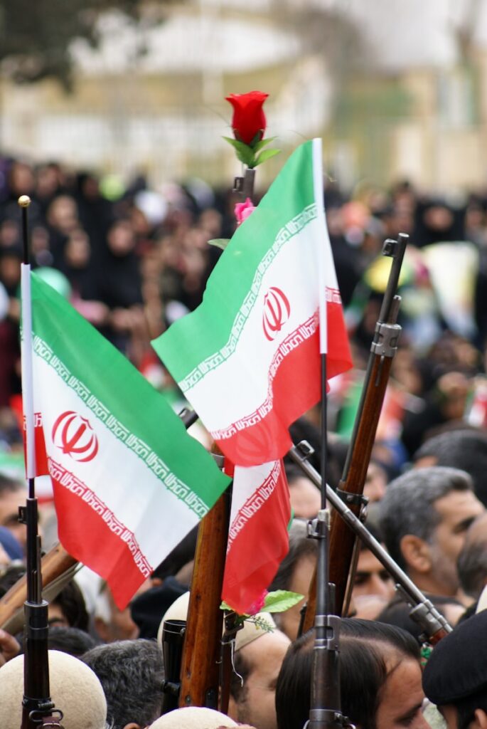 people holding flags during daytime