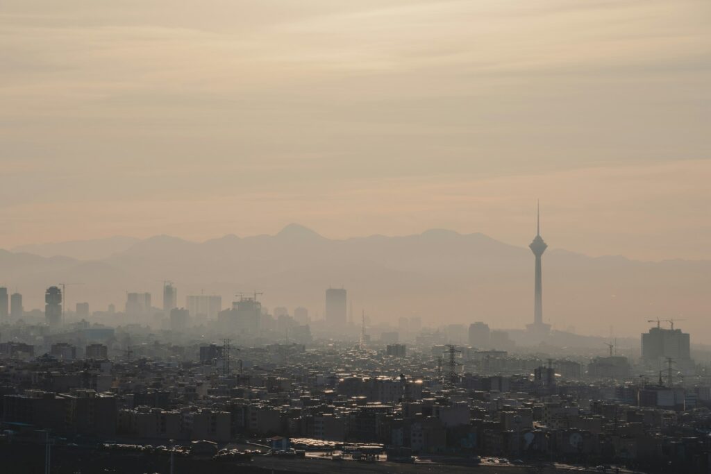 city skyline under white sky during daytime