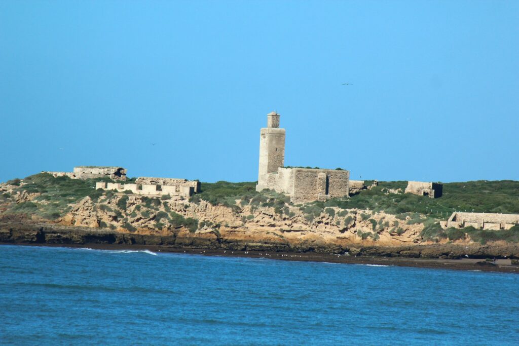 a stone castle on a hill