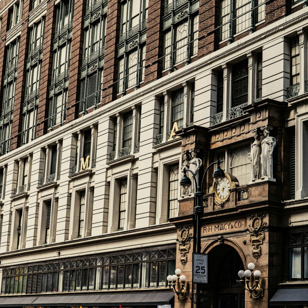 An ornate building facade features architectural details.