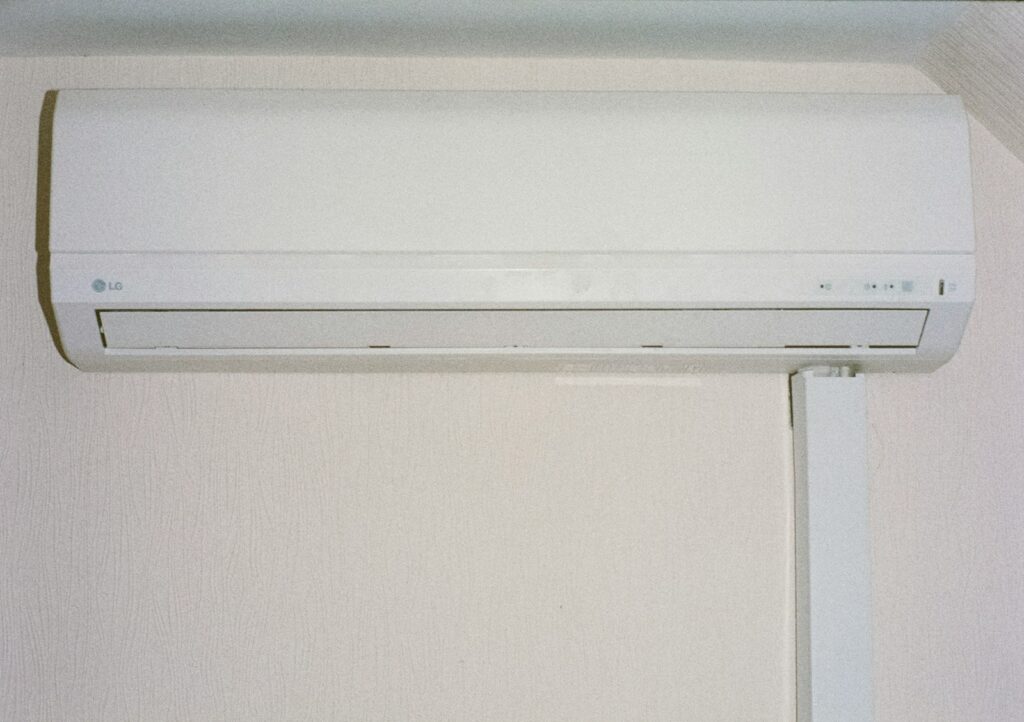 A white air conditioner mounted on a wall.