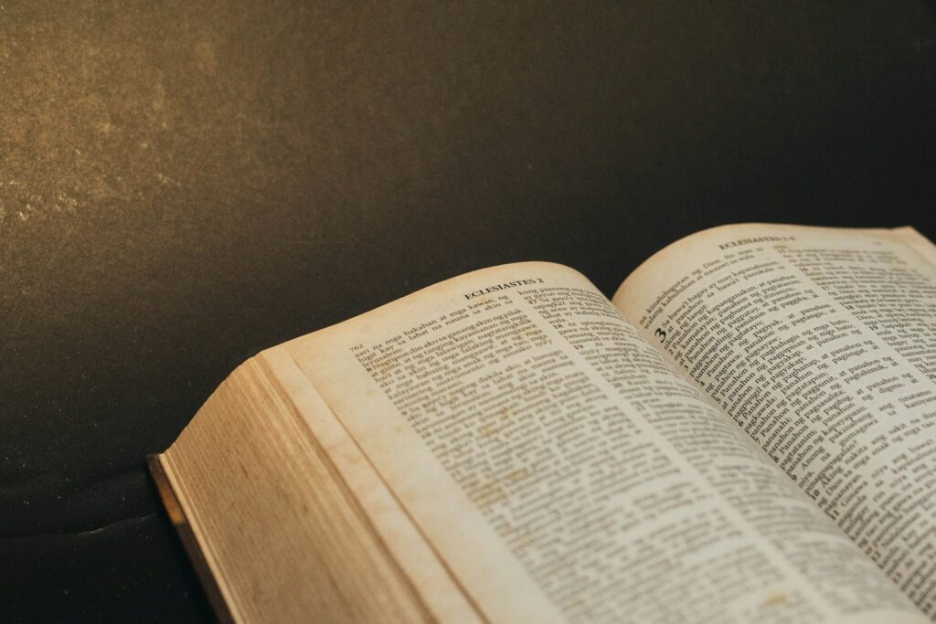 an open book sitting on top of a table