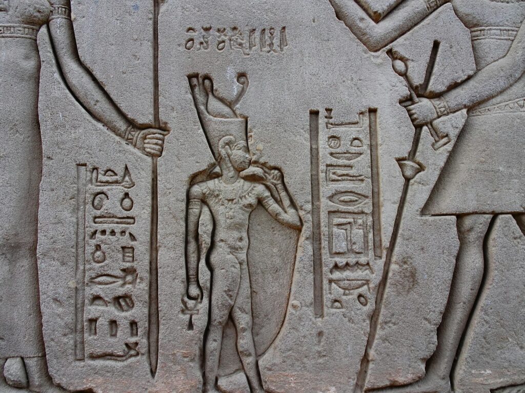 a stone with carvings on it